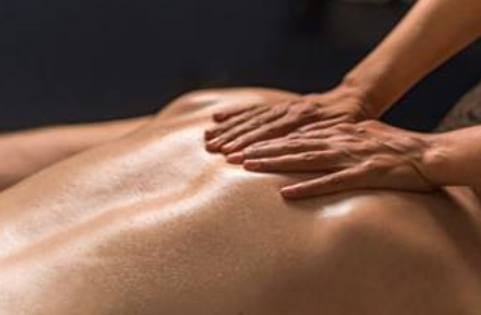 lady enjoying a relaxing back massage